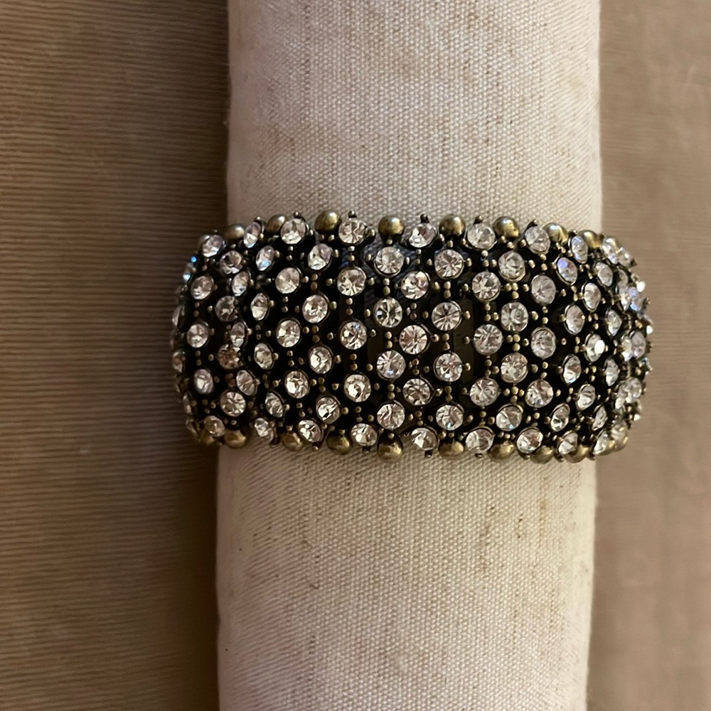 Crystal brass fashion bracelet with matching earrings.